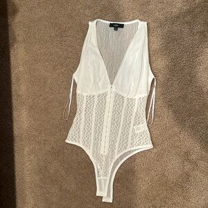 Lulu’s lace bodysuit
